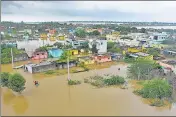  ?? ?? A view of a flooded area in Nellore, Andhra Pradesh, on Saturday after heavy rains lashed the district.