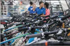  ?? ELI MEXLER ?? A Giant bikes store in central Phnom Penh in 2014.