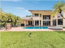  ?? JOEL_ESQUENAZI/RELATEDISG REALTY ?? The pool and lanai area of a home listed for one million dollars in Pembroke Pines.