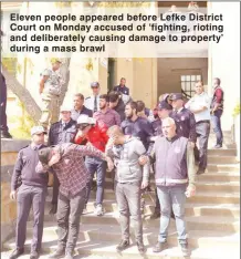  ??  ?? Eleven people appeared before Lefke District Court on Monday accused of ‘fighting, rioting and deliberate­ly causing damage to property’ during a mass brawl