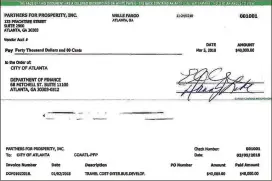  ??  ?? Partners for Prosperity, a nonprofit formed by the city’s economic developmen­t agency, Invest Atlanta, issued this $40,000 check to defray the cost of business-class travel for former Mayor Kasim Reed and some of his entourage.