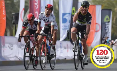  ?? Supplied photo ?? Mark Cavendish celebrates after winning the Abu Dhabi — Al Ain Classic on Sunday in Abu Dhabi. — Profession­al and amateur riders took part in the race