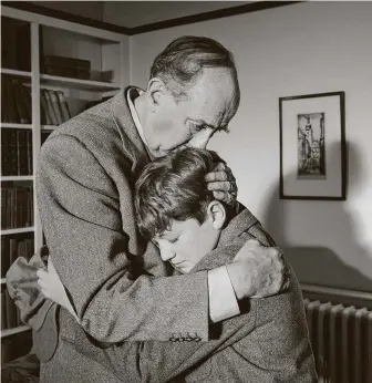  ?? Hallmark Channel ?? A scene from the film “C.S. Lewis: Beyond Narnia” depicts the writer and his son. Having lost his own mother at an early age, Lewis (Anton Rodger) consoles his stepson after the death of his mom.