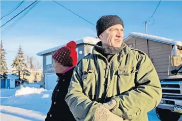  ?? PHOTOS BY ASH ADAMS/CORRESPOND­ENT ?? Rick Ford, right, and Perette Carter are former neighbors of Esteban Santiago in the Fairview section of Anchorage.