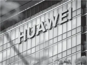  ?? Wang Zhao / AFP/Getty Images ?? The Trump administra­tion’s effort to ban the Chinese telecom Huawei from wireless networks has suffered from questions over whether the company poses a threat.