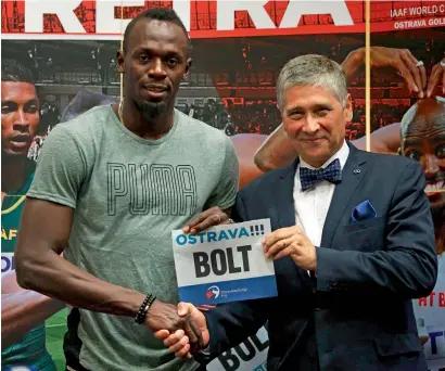  ?? — AFP ?? Jamaican sprinter Usain Bolt (left) and district chief executive Ivo Vondrak during a Press conference in Ostrava.