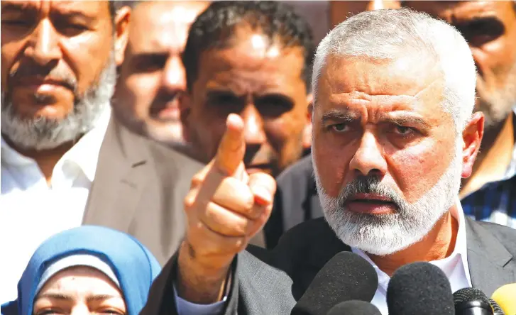  ??  ?? HAMAS LEADER Ismail Haniyeh gestures during a news conference in Gaza City earlier this month.