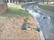  ?? [PHOTO PROVIDED] ?? Parks and Recreation crews found electric scooters at the bottom of Bricktown Canal.