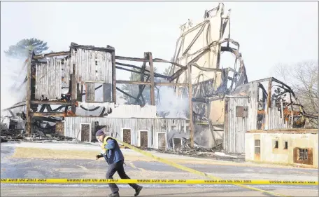  ?? Ned Gerard / Hearst Connecticu­t Media ?? The Shakespear­e theater, in Stratford burned to the ground early Sunday morning. The theater opened in 1955 as the American Shakespear­e Festival Theatre, the building had stood vacant for many years.