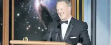  ?? CHRIS PIZZELLO/THE ASSOCIATED PRESS ?? Sean Spicer speaks at the 69th Emmy Awards on Sunday. His appearance was met with jeers from some critics of U.S. President Donald Trump.