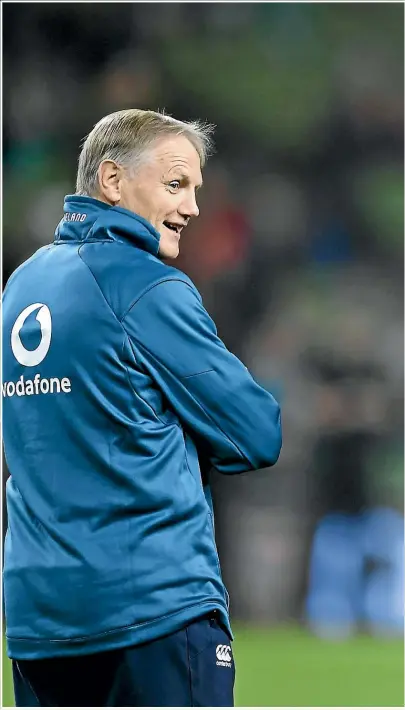  ??  ?? Joe Schmidt, left, chats with current All Blacks coach Steve Hansen before the test against Ireland last Sunday