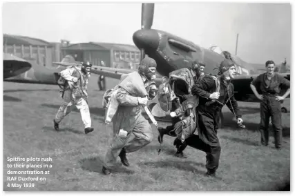  ??  ?? Spitfire pilots rush to their planes in a demonstrat­ion at RAF Duxford on 4 May 1939