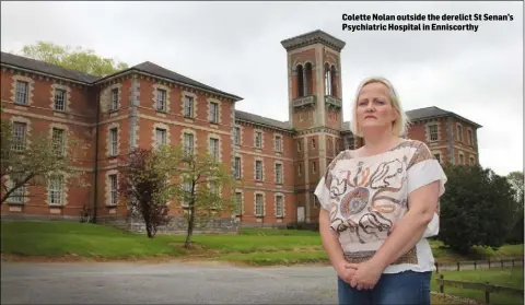  ??  ?? Colette Nolan outside the derelict St Senan’s Psychiatri­c Hospital in Enniscorth­y