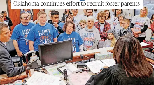  ?? [PHOTO BY STEVE GOOCH, THE OKLAHOMAN] ?? ABOVE: Will Yeary, 16, left, stands with his parents, Barbara and Patrick Yeary, and his brother, J.J. Yeary, as his adoption is finalized Tuesday before Judge Cassandra Williams at the Oklahoma Juvenile Justice Center in Oklahoma City.