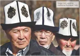  ??  ?? Kyrgyz men wearing traditiona­l ‘Ak-Kalpak’ hats.
