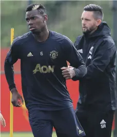  ?? AFP ?? Paul Pogba’s training ground spat with Jose Mourinho perfectly illustrate­s the current problems at Manchester United