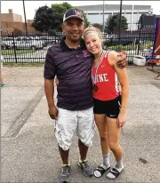  ?? CONTRIBUTE­D ?? Taylor Robertson with Wayne High School track coach Michael Fernandez, whom she says is “like a second dad to me.” He took her under his wing when she was diagnosed with lupus and found herself dealing with rheumatoid arthritis, as well. She became a state champion for Wayne and Fernandez, who had 241 state qualifiers at Wayne during his 23 years as coach, calls her “one of the top five kids I’ve ever coached.”