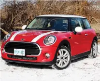  ?? PETER BLEAKNEY/DRIVING ?? Chili Red paint on your 2019 Mini Cooper costs $590, while the white hood stripes add another $150 to the price tag.