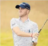  ?? FRANCOIS NEL/GETTY IMAGES ?? Justin Thomas is just one of the core group of young American players who are dominating the major championsh­ips right now.