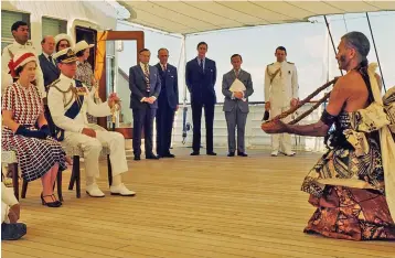  ??  ?? Royal Silver Jubilee Tour 1977: February 1977: Queen Elizabeth II and Prince Philip are presented with a tabua in Fiji.