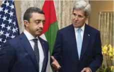  ?? EVAN VUCCI/AFP/GETTY IMAGES ?? U.S. Secretary of State John Kerry speaks with Foreign Minister Abdullah bin Zayed of the United Arab Emirates about the Syrian conflict on Friday.