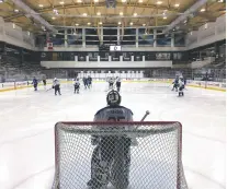  ?? JOHN WAWROW/THE ASSOCIATED PRESS ?? Goalie Mike Marino awaits the next faceoff Thursday as the 11-day hockey marathon entered its seventh day in Buffalo, N.Y.