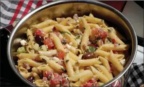  ?? (TNS/St. Louis Post-Dispatch/Hillary Levin) ?? Pasta Salad with Black Olives and Feta