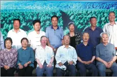  ?? PHOTOS BY ZOU HONG / CHINA DAILY ?? From left: A group photo of the first generation of Saihanbaer­s, people who came in the 1960s to plant trees; Liu Guo, 51, with his work diary; tourism is booming at Saihanba.