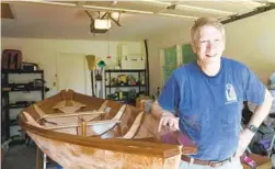  ?? BARBARA HADDOCK TAYLOR/BALTIMORE SUN ?? David Cantor is building a 17-foot Northeaste­r Dory sailboat in his garage. He purchased the boat as a kit from Chesapeake Light Craft of Annapolis.