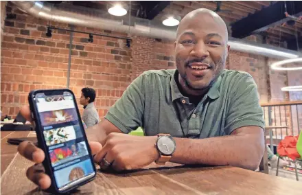  ?? PHOTOS BY RICK WOOD / MILWAUKEE JOURNAL SENTINEL ?? Rick Banks (pictured) and Paul Wellington have launched the MKE Black app, designed to highlight black business, cultural sites, calendars and networking.