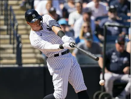  ?? DAVID J. PHILLIP — THE ASSOCIATED PRESS ?? New York Yankees’ Aaron Judge (99) swings for a strike during the second inning of a spring training baseball game against the Atlanta Braves Sunday, Feb. 26, 2023, in Tampa, Fla.