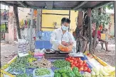  ?? RISHIKESH CHOUDHARY/HT ?? Kalyan Harale, who worked at a firm in Mumbai which was shut after the lockdown, now depends on selling vegetables in his locality in Ulhasnagar to earn a living.