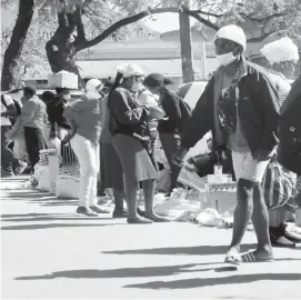 ??  ?? Vendors back on the strees of Bulawayo, flouting lockdown regulation­s with impunity which might be due to ignorance about the deadliness of Covid-19