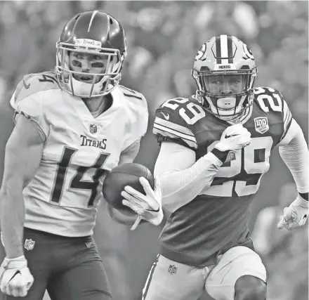  ?? ADAM WESLEY / USA TODAY NETWORK-WISCONSIN ?? Packers safety Kentrell Brice, shown chasing the Titans’ Nick Williams, hasn’t been called for a penalty for use of his helmet.