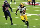  ?? Brett Coomer / Staff photograph­er ?? Packers receiver Davante Adams had 13 catches for 196 yards and two touchdowns against the Texans.