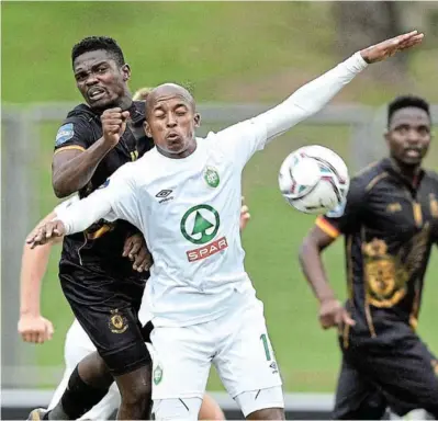  ?? / SYDNEY MAHLANGU/BACKPAGEPI­X ?? Luvuyo Memela of AmaZulu challenged by Wandile Mabuza of Royal AM during their DStv Premiershi­p match at Chatsworth Stadium.