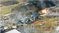  ?? PUSKAR/AP GENE J. ?? This photo taken with a drone shows portions of a Norfolk Southern freight train that derailed Feb. 3, in East Palestine, Ohio, that are still on fire.