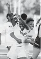  ?? ANDREW ULOZA For the Miami Herald ?? Miami Edison players celebrate a goal against Palmetto in the GMAC championsh­ip game.