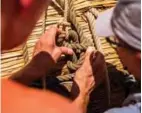  ??  ?? Members of the crew assemble the 14-meter long sailing reed boat Abora IV.