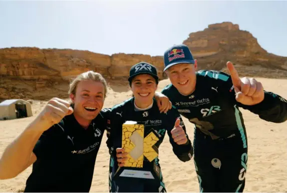  ?? (Extreme E) ?? Nico Rosberg (left), Molly Taylor and Johan Kristoffer­sson celebrate victory