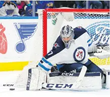  ?? BILLY HURST/THE ASSOCIATED PRESS ?? Winnipeg Jets goaltender Connor Hellebuyck has been getting extra days of rest down the stretch as the team tries to manage his workload heading into his first playoff appearance.