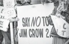  ?? Steve Gonzales / Staff photograph­er ?? Protesters rally outside the Greater Houston Partnershi­p building in April to demand the business group oppose the voter bills by the Texas Legislatur­e.