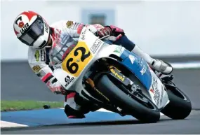  ??  ?? Above: Carl Fogarty had a wildcard ride at the British GP in 1992. He was going well on his Harris YZR500 when he crashed on oil (the incident where Kevin Schwantz demonstrat­ed how to wave an oil flag)
