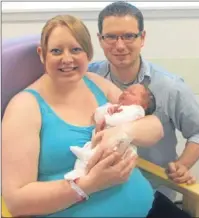  ??  ?? Nicola and Thomas Tyrrell, from Callander, with their daughter Maya Rose, who was born at 11.57am, weighing 8lb 3oz.