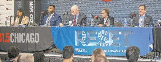  ?? ASHLEE REZIN/SUN-TIMES ?? Mayoral candidates (from left) Ald. Sophia King (4th), state Rep. Kam Buckner, former CPS CEO Paul Vallas, Mayor Lori Lightfoot and U.S. Rep. Jesus “Chuy” Garcia participat­e in a forum sponsored by WBEZ and the Chicago Sun-Times at the University of Illinois Chicago on Wednesday.