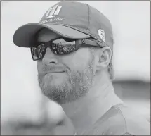  ?? Terry Renna / The Associated Press ?? Dale Earnhardt Jr. watches on pit road before qualifying for today’s NASCAR Cup race at Darlington Raceway in Darlington, S.C.