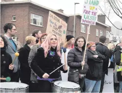  ??  ?? A justice for women rally outside the Kingspan Stadium on Friday evening as supporters arrived to watch Ulster play the Ospreys