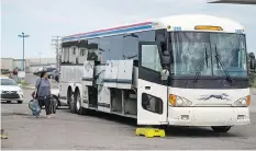  ?? LIAM RICHARDS ?? A Greyhound bus leaves the Marquis Drive Husky truck stop in Saskatoon on Monday. Greyhound will end services across Western Canada in the fall, save for one route between Vancouver and Seattle.