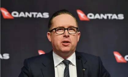  ?? Photograph: Dean Lewins/AAP ?? Alan Joyce has defended having Qantas staff stood down, saying the airline expects domestic borders to be closed for two more months.