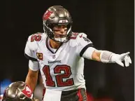  ?? Danny Karnik / Associated Press ?? Quarterbac­k Tom Brady and the Buccaneers will host the Cowboys on Monday night in an NFC wild-card game.